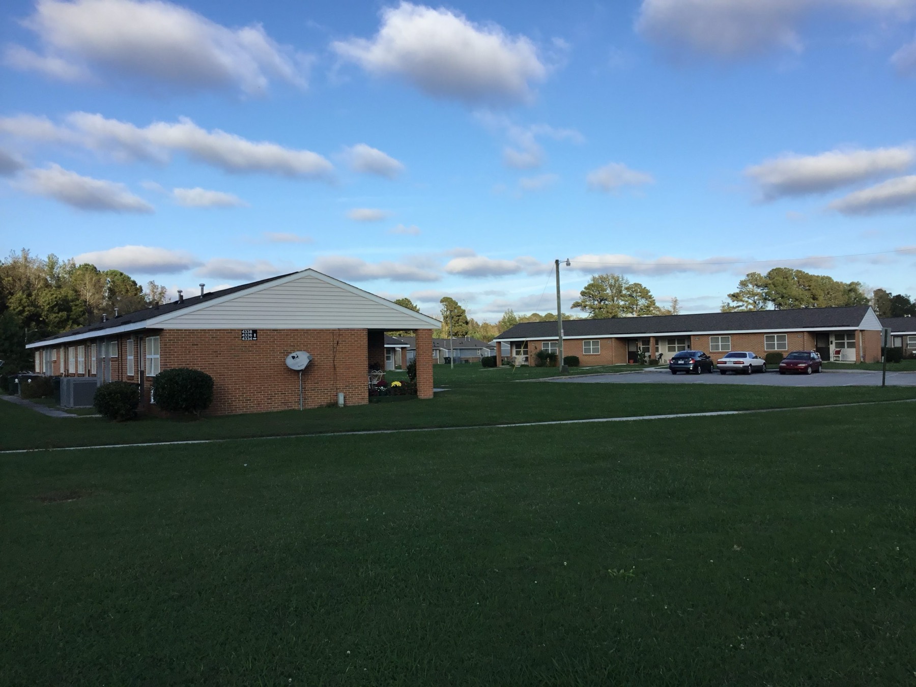 Single-storey brick apartments at Farmville Housing Authority Site #1